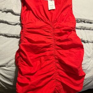 New red knee length dress from Zara size large zips in the back